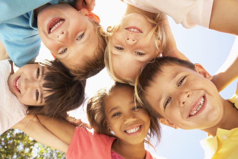 Group Of Children Looking Down Into Camera — Le Balcon des Écrins à Réallon