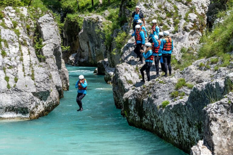 Adventurous refreshing jump from limestone rock into cold… — Canyoning
