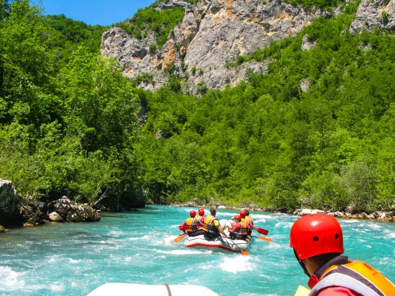 Boat on the fast mountain river — Rafting